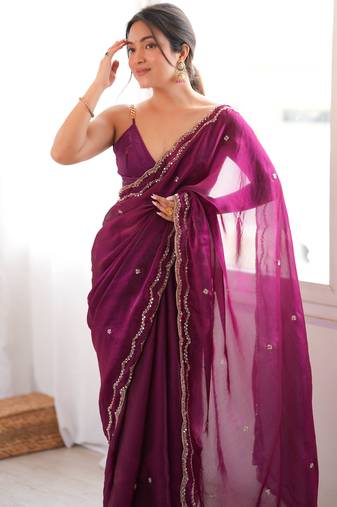 Wine tissue satin sequins saree with unstitched blouse piece.