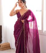 Wine tissue satin sequins saree with unstitched blouse piece.