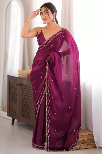 Wine tissue satin sequins saree with unstitched blouse piece.