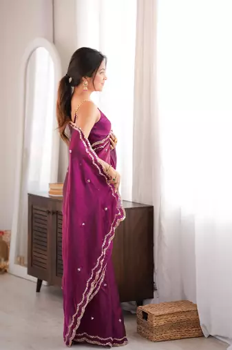 Wine tissue satin sequins saree with unstitched blouse piece.