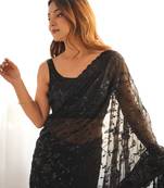 Black tissue satin sequins saree with unstitched blouse piece.
