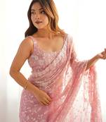 Onion tissue satin sequins saree with unstitched blouse piece.