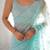 Sky blue tissue satin sequins saree with unstitched blouse piece.