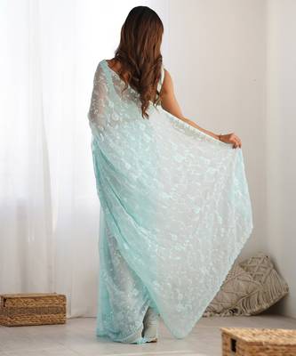 Sky blue tissue satin sequins saree with unstitched blouse piece. 4