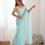 Sky blue tissue satin sequins saree with unstitched blouse piece.