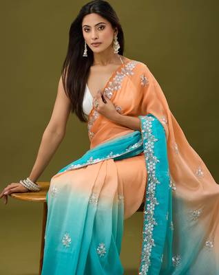 Orange & sky blue tissue satin embellished saree with unstitched blouse piece. 1