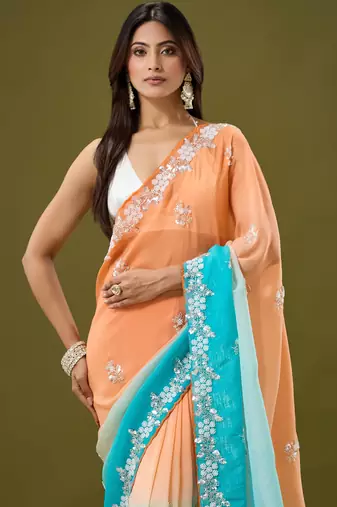 Orange & sky blue tissue satin embellished saree with unstitched blouse piece.
