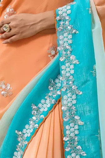 Orange & sky blue tissue satin embellished saree with unstitched blouse piece.