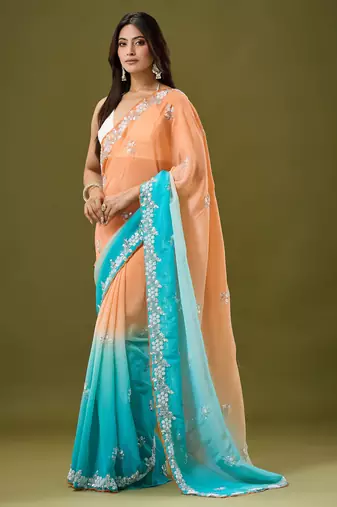 Orange & sky blue tissue satin embellished saree with unstitched blouse piece.