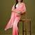 Peach tissue satin embellished saree with unstitched blouse piece.