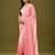Peach tissue satin embellished saree with unstitched blouse piece.