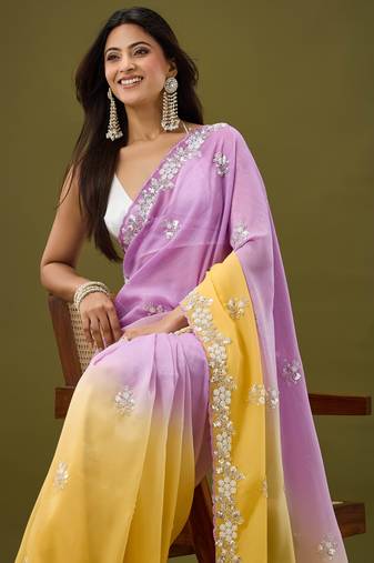 Lavender tissue satin embellished saree with unstitched blouse piece.