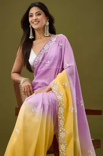 Lavender tissue satin embellished saree with unstitched blouse piece.