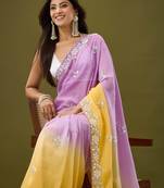 Lavender tissue satin embellished saree with unstitched blouse piece.