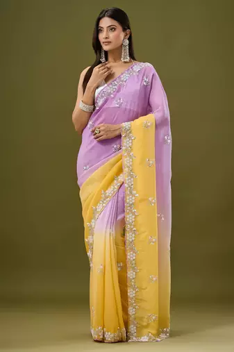 Lavender tissue satin embellished saree with unstitched blouse piece.