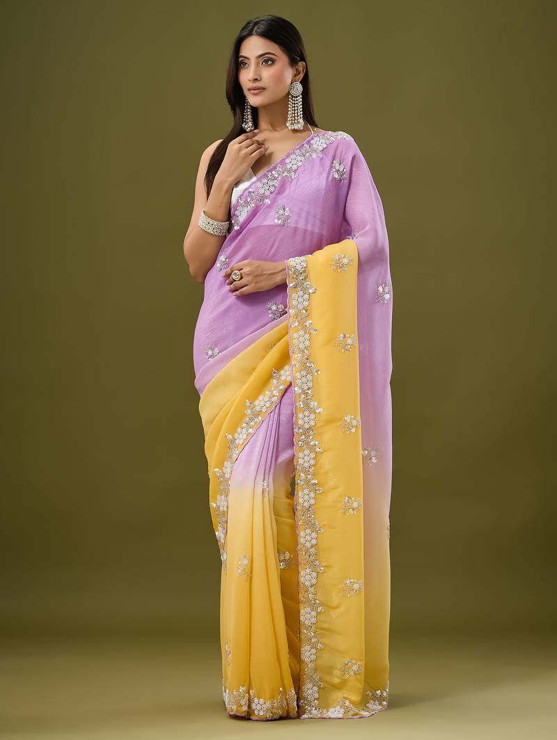 Lavender tissue satin embellished saree with unstitched blouse piece.