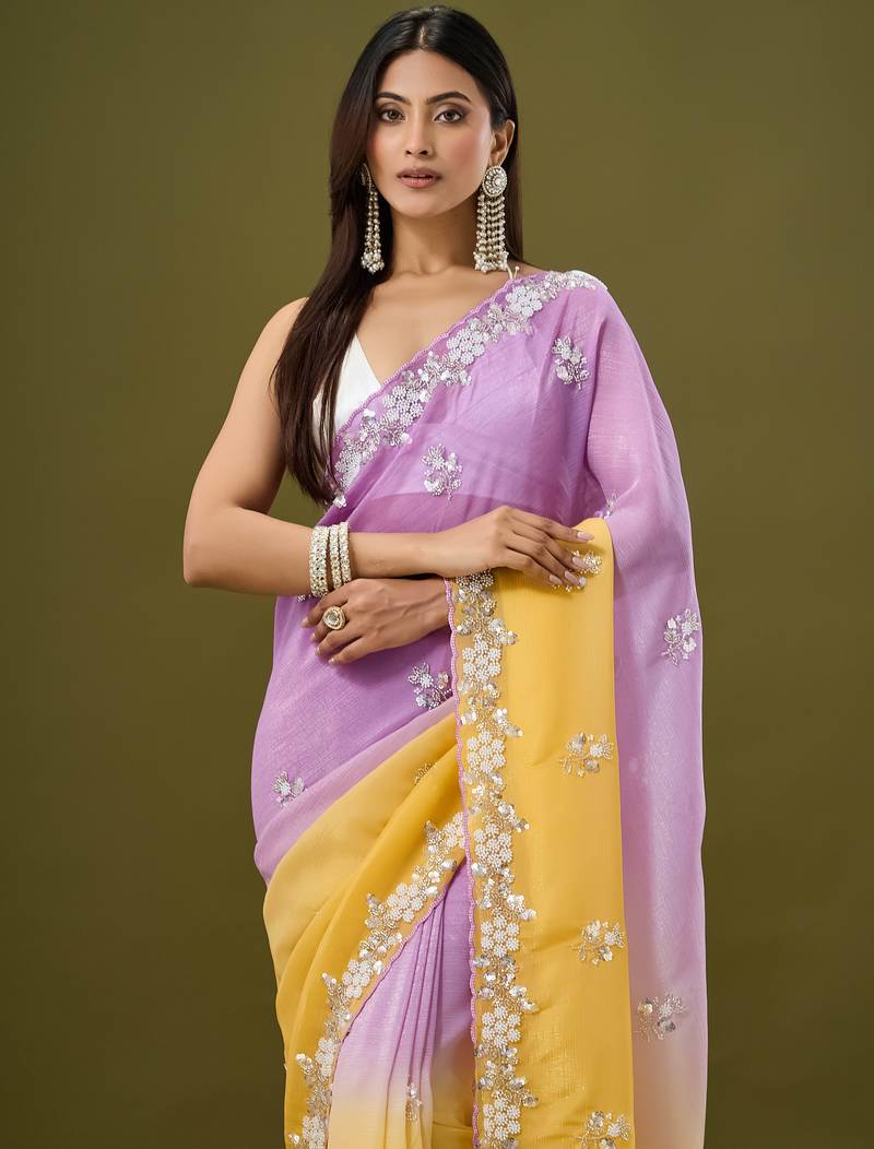 Lavender tissue satin embellished saree with unstitched blouse piece.