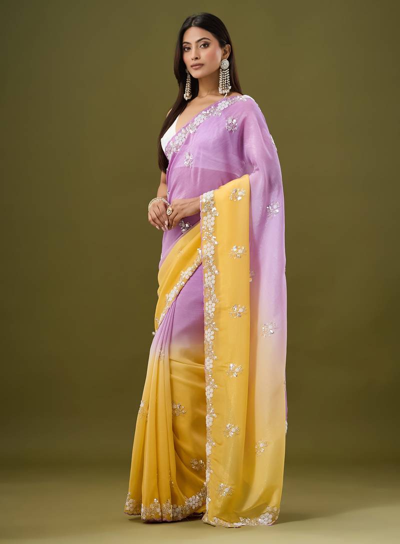 Lavender tissue satin embellished saree with unstitched blouse piece.