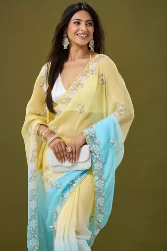 Yellow & sky blue tissue satin embellished saree with unstitched blouse piece.
