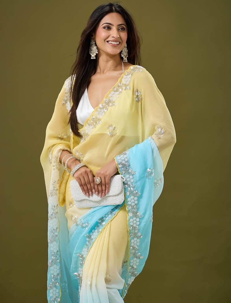 Yellow & sky blue tissue satin embellished saree with unstitched blouse piece.