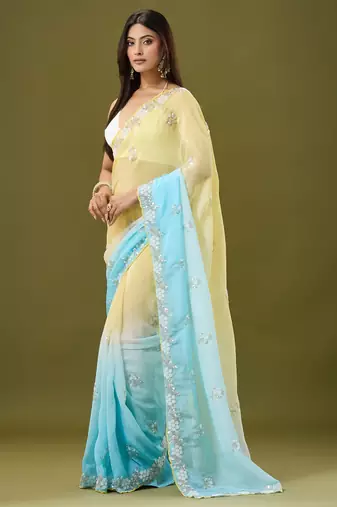 Yellow & sky blue tissue satin embellished saree with unstitched blouse piece.