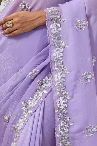 Lilac tissue satin embellished saree with unstitched blouse piece.