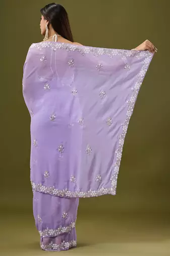 Lilac tissue satin embellished saree with unstitched blouse piece.