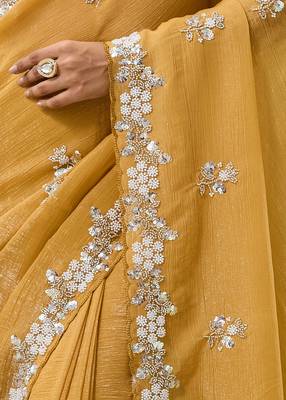 Mustard tissue satin embellished saree with unstitched blouse piece. 3