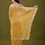 Mustard tissue satin embellished saree with unstitched blouse piece.