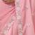 Pink tissue satin embellished saree with unstitched blouse piece.
