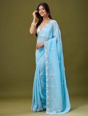 Sky blue tissue satin embellished saree with unstitched blouse piece. 5