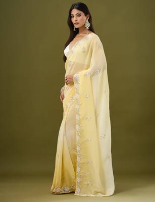 Yellow tissue satin embellished saree with unstitched blouse piece. 5