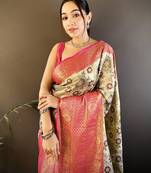 cream silk blend saree with unstitched blouse piece.