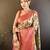 cream silk blend saree with unstitched blouse piece.