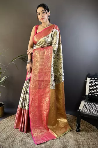 cream silk blend saree with unstitched blouse piece.