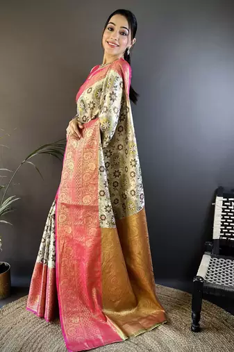 cream silk blend saree with unstitched blouse piece.