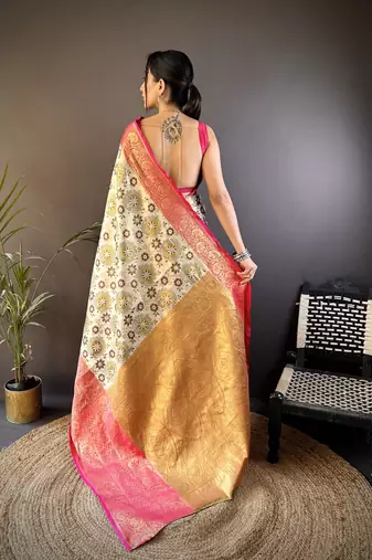 cream silk blend saree with unstitched blouse piece.