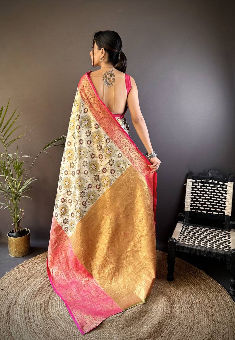 cream silk blend saree with unstitched blouse piece.