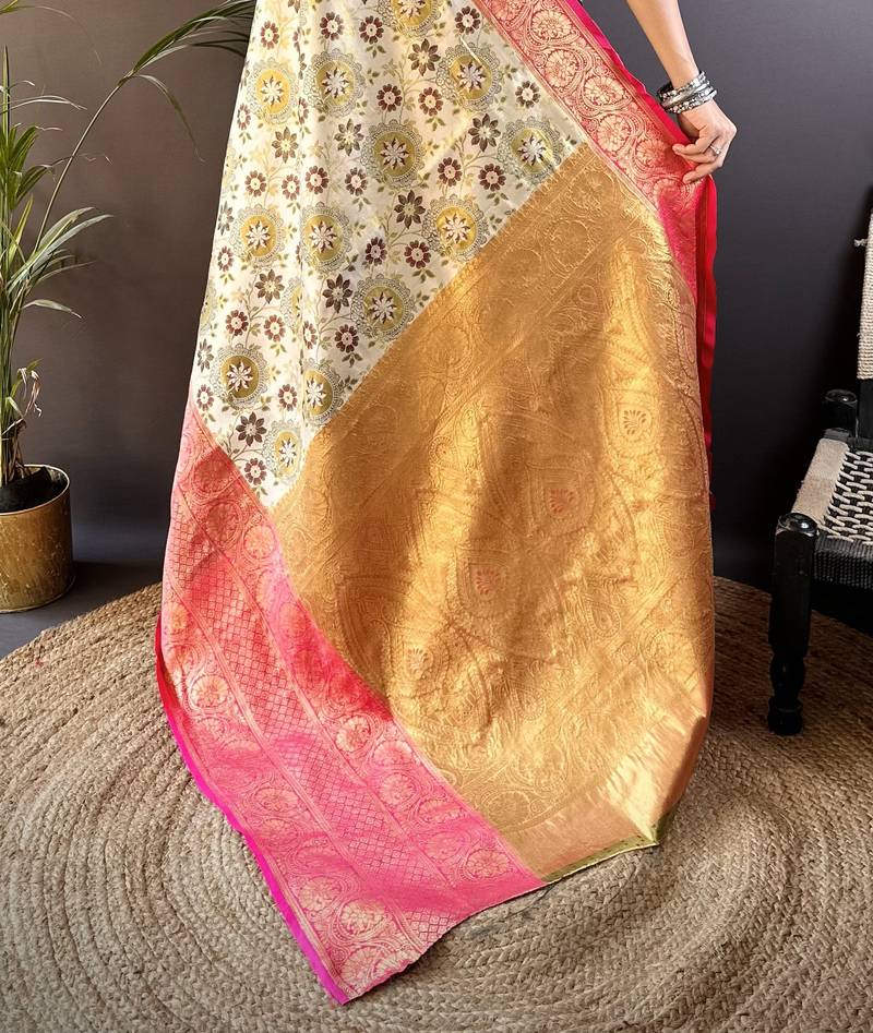 cream silk blend saree with unstitched blouse piece.