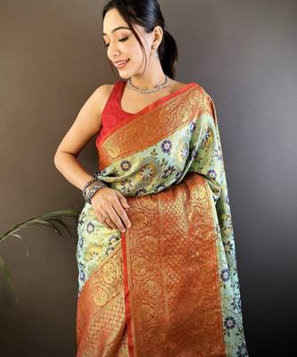 green silk blend saree with unstitched blouse piece. 1