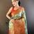 green silk blend saree with unstitched blouse piece.