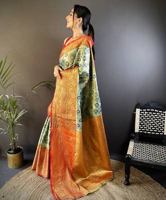 green silk blend saree with unstitched blouse piece. 3