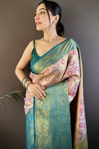 peach silk blend saree with unstitched blouse piece.