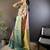 peach silk blend saree with unstitched blouse piece.
