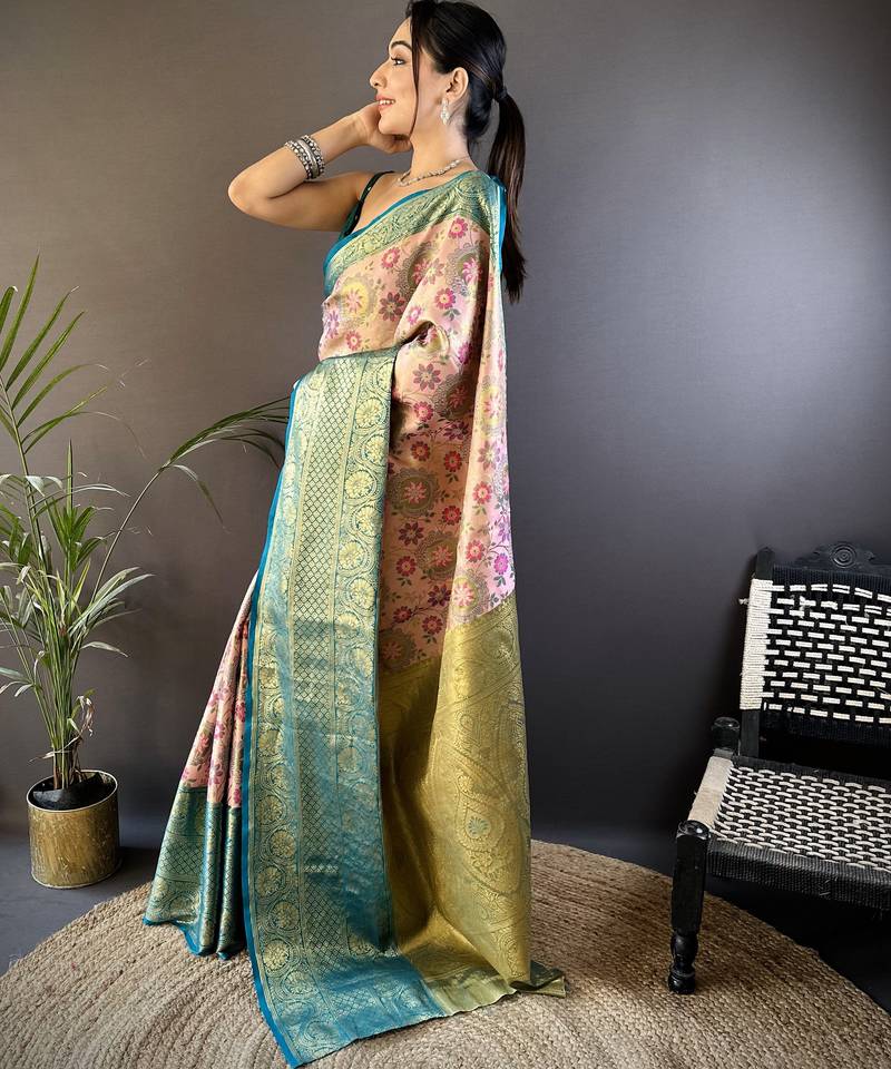 peach silk blend saree with unstitched blouse piece.