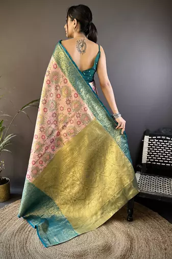 peach silk blend saree with unstitched blouse piece.