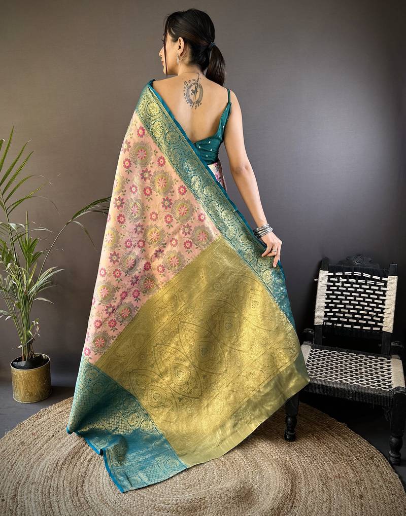 peach silk blend saree with unstitched blouse piece.
