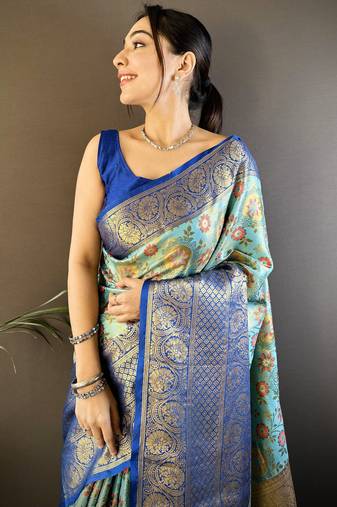 sky blue silk blend saree with unstitched blouse piece.