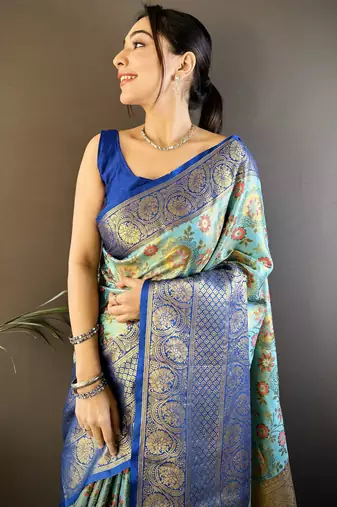 sky blue silk blend saree with unstitched blouse piece.