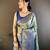 sky blue silk blend saree with unstitched blouse piece.